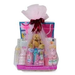 Hadiah bayi lucu dengan boneka beruang, perlengkapan bayi, dan pita merah, online florist