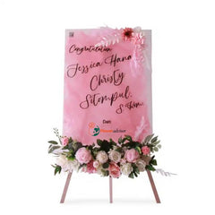 Bunga ucapan selamat dari online florist dengan rangkaian mawar pink dan hijauan elegan