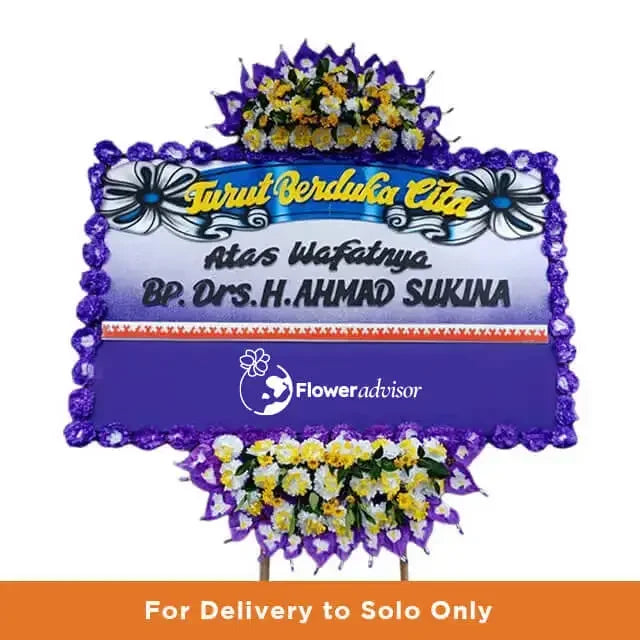 Bunga papan duka cita online florist untuk pengiriman ke Solo, elegan dengan bunga kuning dan ungu