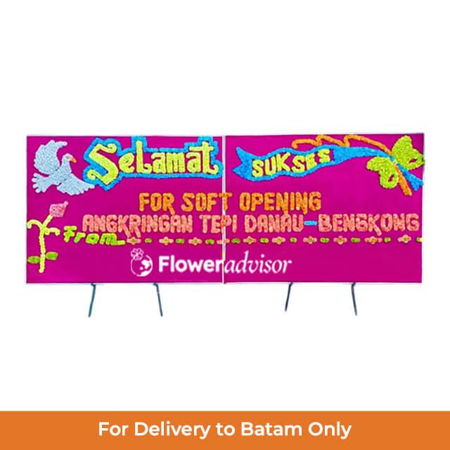 Bunga papan selamat sukses soft opening dari online florist FlowerAdvisor untuk Batam