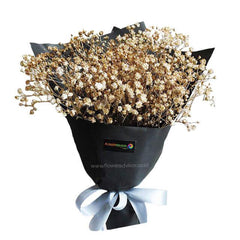 Bouquet bunga kering berwarna emas, dikemas rapi dengan pita biru muda, dari online florist terpercaya.