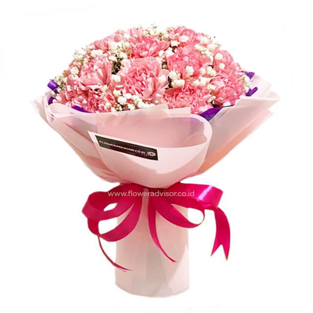Bouquet bunga mawar pink cantik dari online florist, dikemas rapi dengan pita merah muda