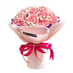 Bouquet bunga mawar pink cantik dari online florist, dikemas rapi dengan pita merah muda