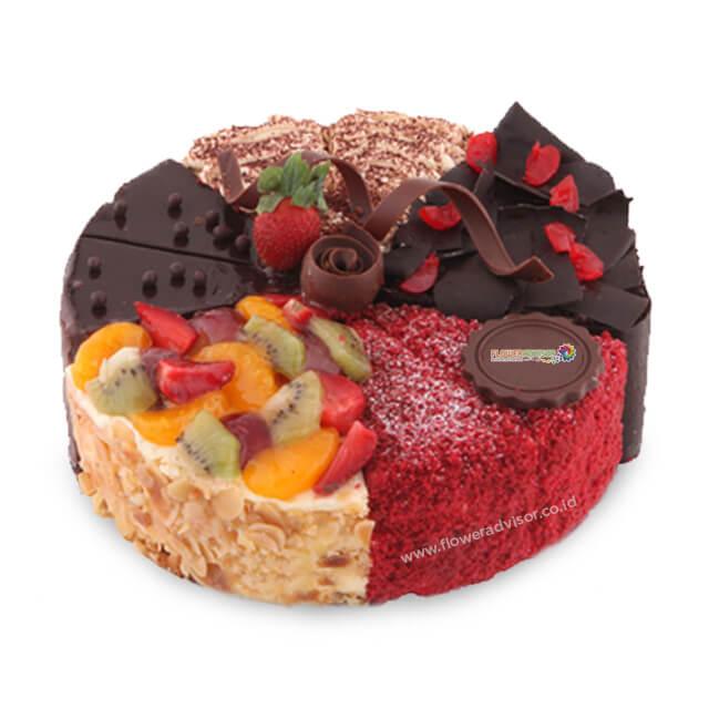 Kue ulang tahun campuran rasa cokelat, buah, dan red velvet dari online florist