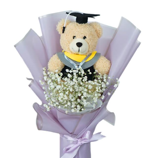 Boneka beruang wisuda dengan bunga baby's breath, online florist terpercaya