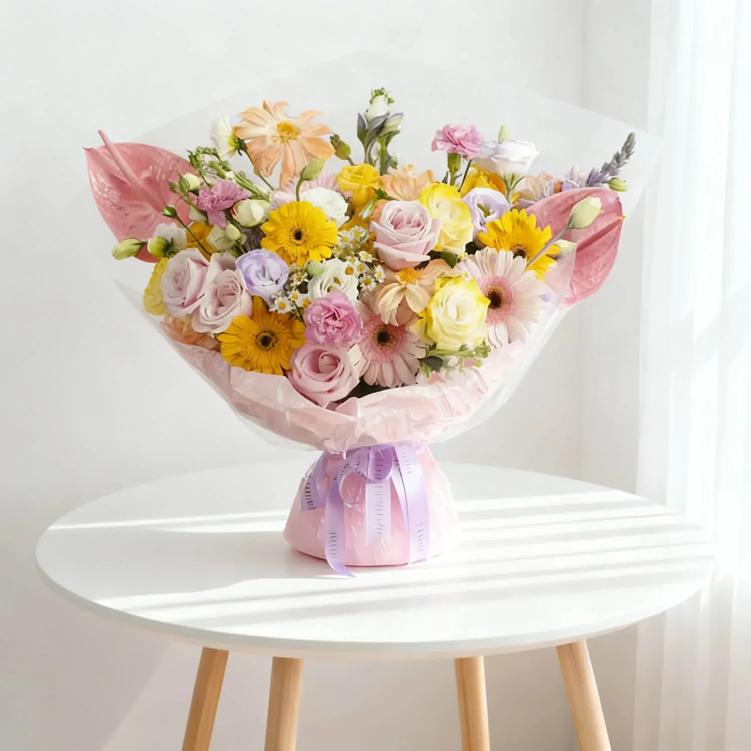 Buket bunga warna-warni cantik dari online florist, dikemas rapi dengan pita ungu, siap dikirim ke seluruh Indonesia.