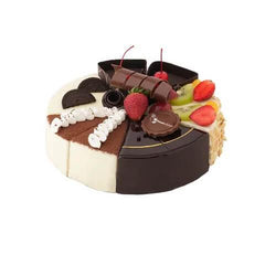 Kue ulang tahun lezat dengan topping buah dan cokelat, pesan online florist terpercaya
