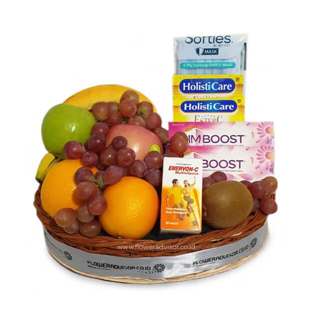 Keranjang buah segar dan vitamin untuk hadiah, dikirim oleh online florist terpercaya