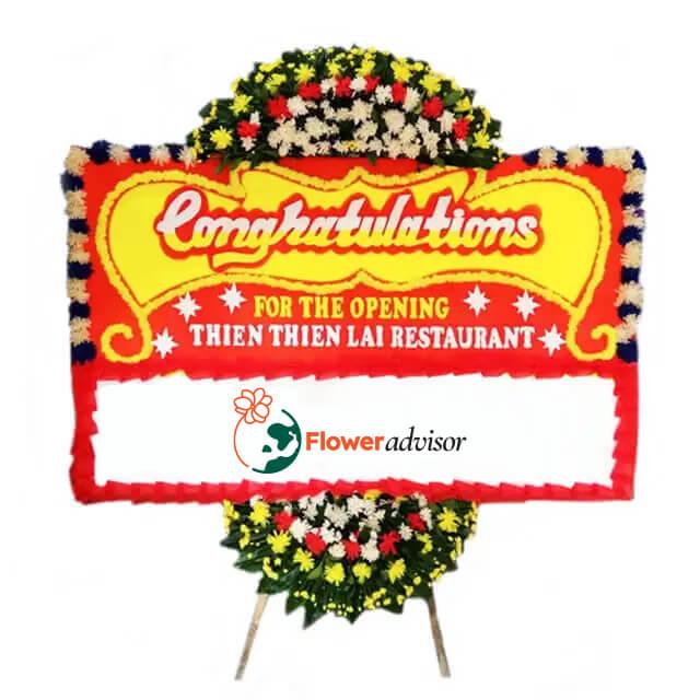 Bunga papan selamat pembukaan restoran dari online florist, rangkaian bunga merah kuning putih