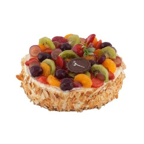Kue buah segar dengan kiwi, stroberi, dan ceri, ideal untuk hadiah dari online florist