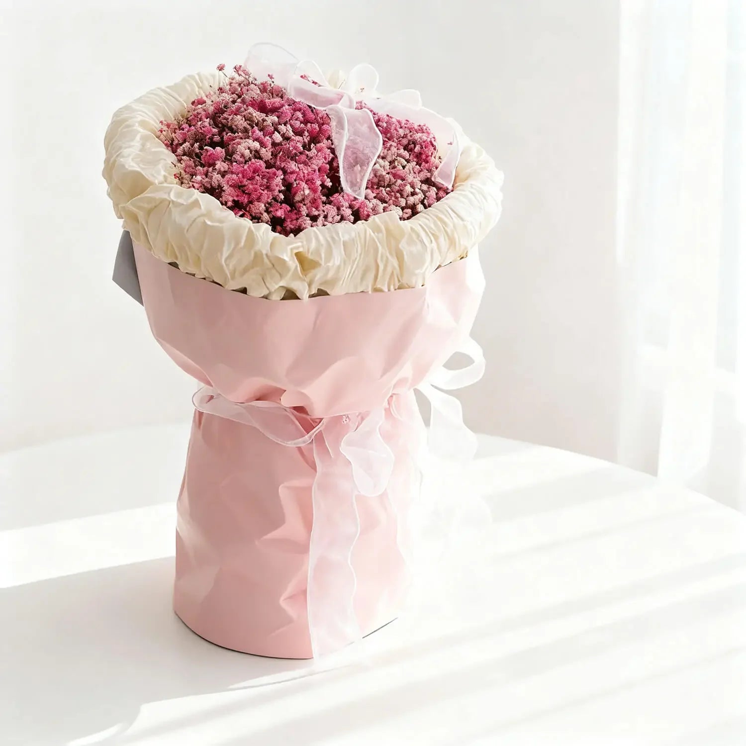 Bouquet bunga kering cantik dengan kemasan pink, online florist terpercaya