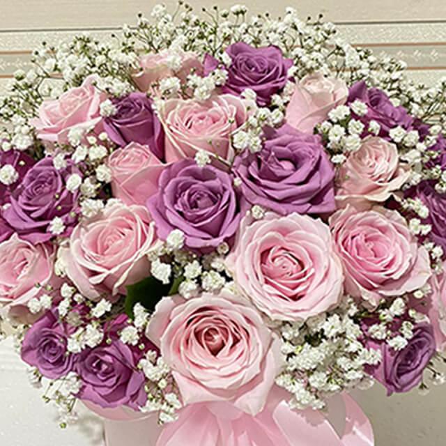 Buket bunga mawar ungu dan pink dengan baby's breath, online florist terpercaya untuk hadiah spesial