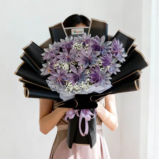 Bouquet unik bunga orkid ungu dengan kemasan elegan, online florist terpercaya