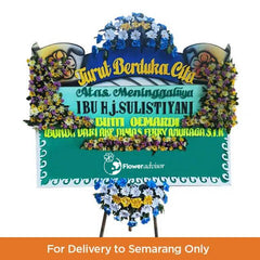 Karangan bunga duka cita online florist untuk pengiriman ke Semarang, rangkaian bunga berwarna biru kuning dengan pita ucapan