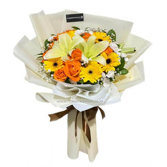 Bouquet bunga segar dari online florist dengan lili, mawar, dan gerbera warna cerah