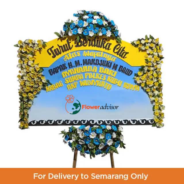 Karangan bunga duka cita online florist dengan bunga biru dan kuning, khusus pengiriman ke Semarang