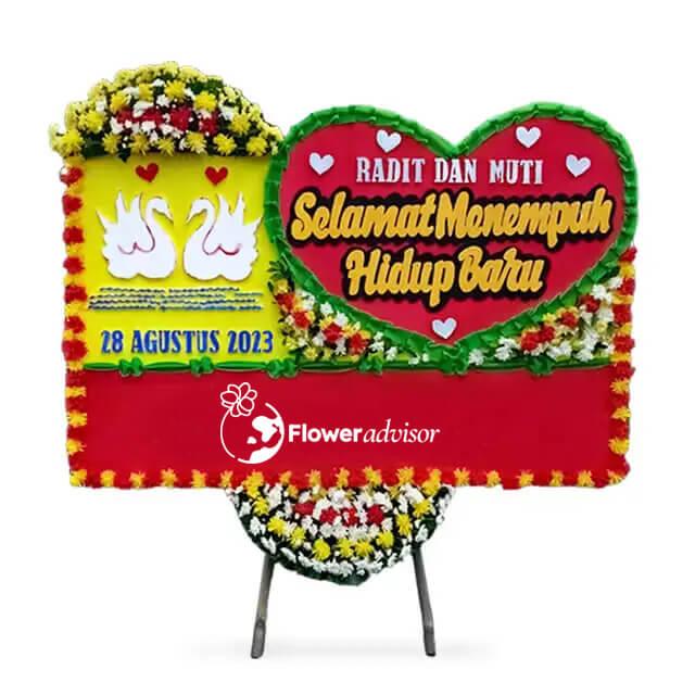 Bunga papan pernikahan online florist dengan desain hati dan swan, cocok untuk ucapan selamat menempuh hidup baru.