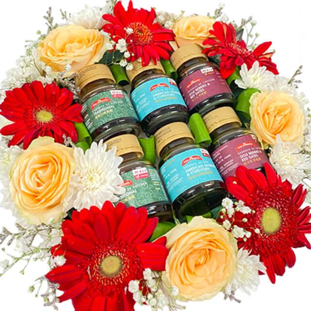 Bouquet bunga merah dan kuning dengan botol saus, online florist terpercaya